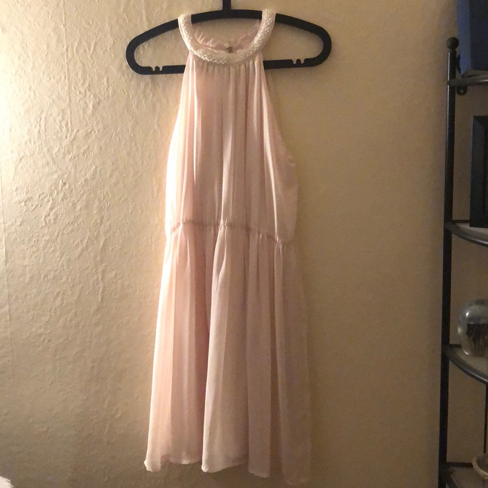 Pink sheet dress with pearl neckline